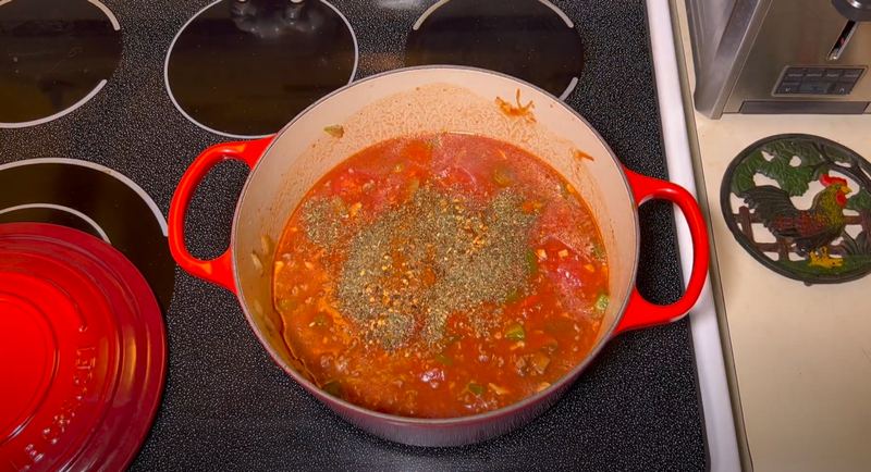 Add the remaining spices from the spaghetti sauce recipe, bring to a boil, then simmer, covered, on low heat.