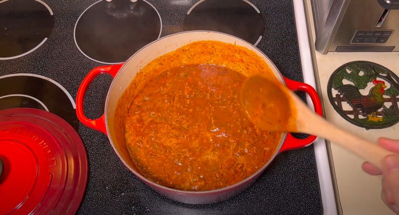 After simmering for 2 hours, the spaghetti sauce should be thick and ready to serve!