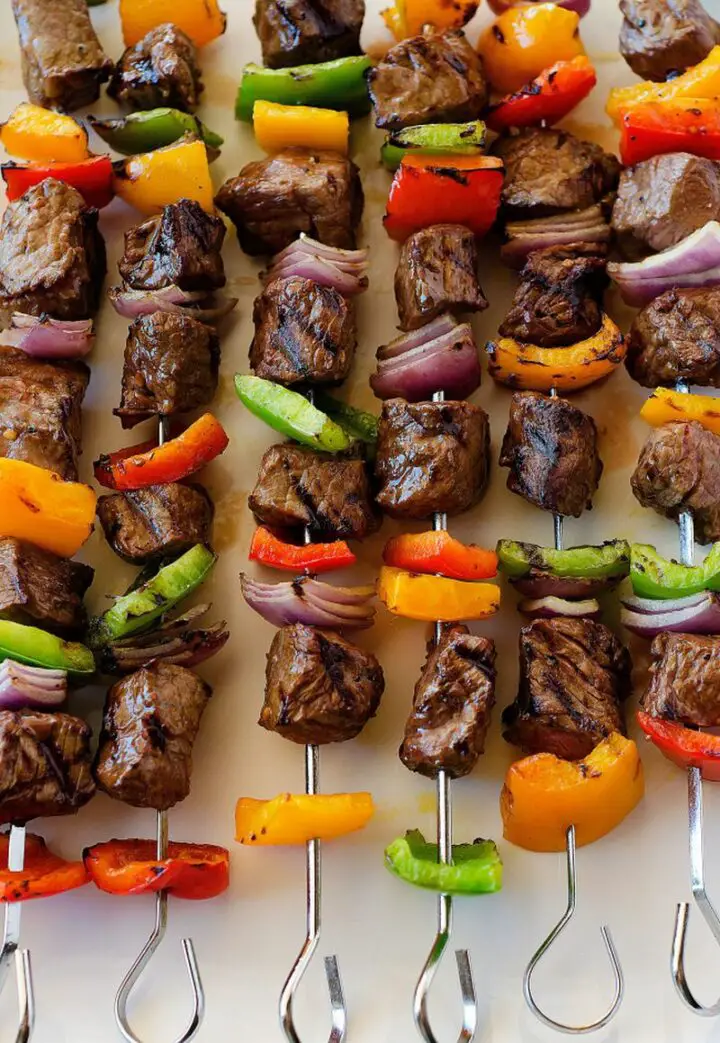 It's grilling time and these delicious steak kebabs with bell pepper and red onion are on the menu! Not only are they beautiful, but these steak kebabs will have you begging for more!