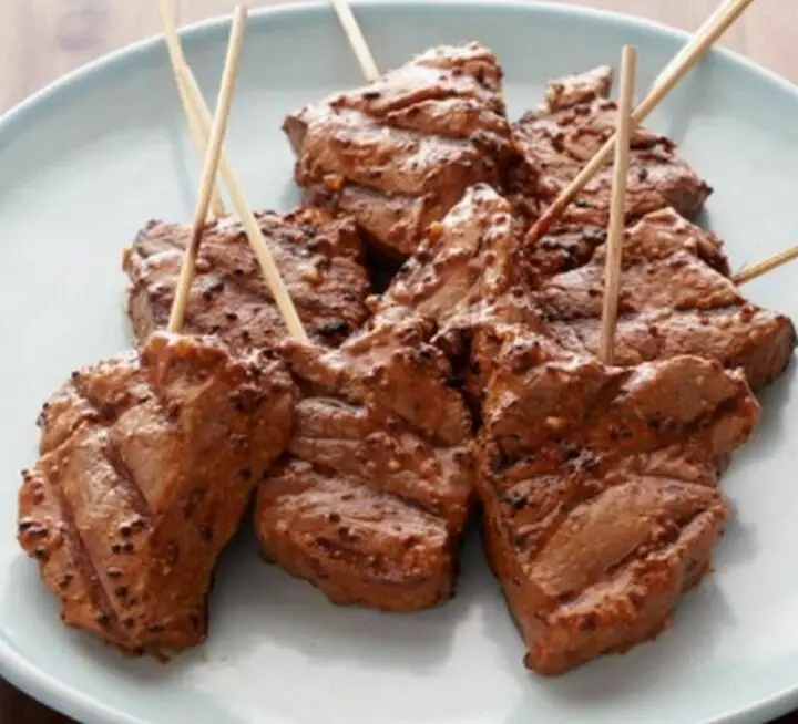 Unlike the other best beef kabob recipes on this list, these delicious gems by Chef Bobby Flay offer an entire slice of beef tenderloin on a stick. They are coated with a garlic-mustard sauce and grilled to perfection.